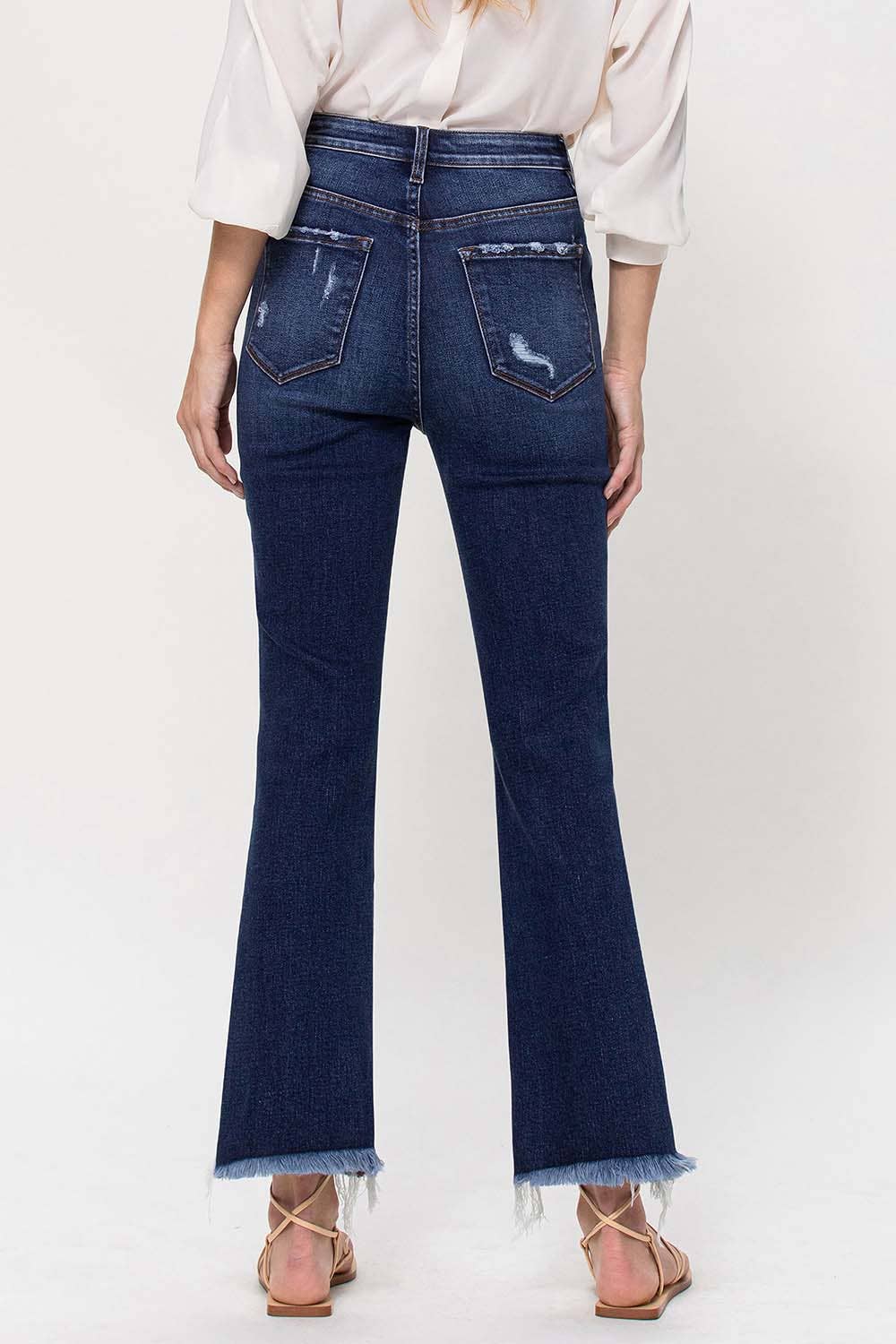 HIGH RISE ANKLE FLARE JEANS W UNEVEN FRAYED HEM