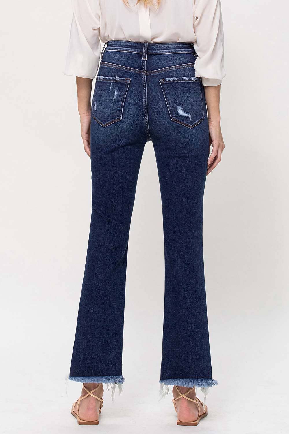 HIGH RISE ANKLE FLARE JEANS W UNEVEN FRAYED HEM
