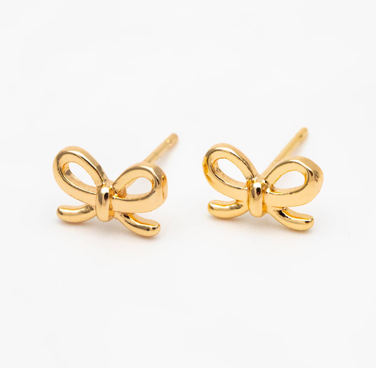 The Lela bow 18k gold plated stud earrings dainty